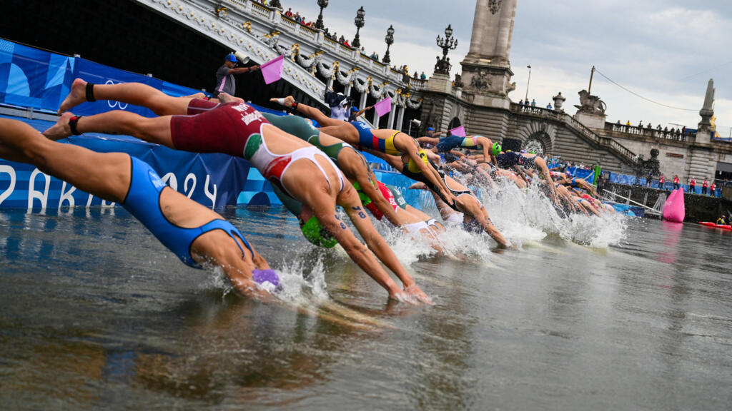 Women’s triathlon begins at Paris Games after tests confirm Seine water quality